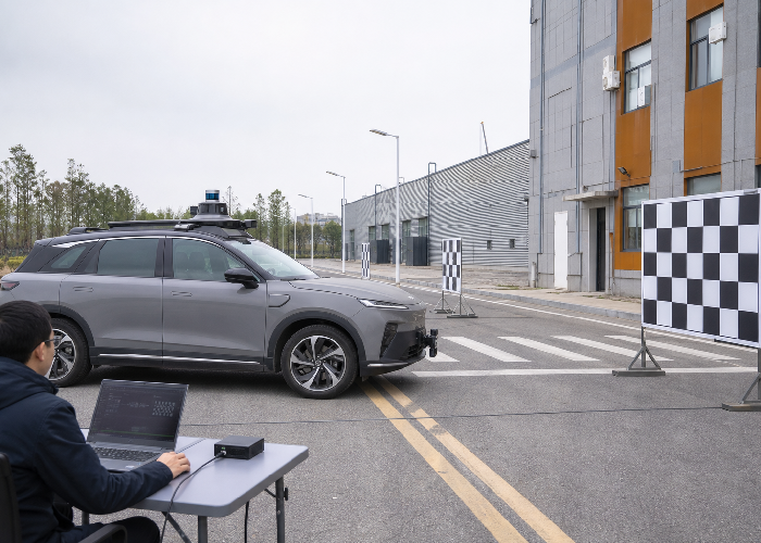 Autonomous test vehicle collecting LiDAR and camera calibration data