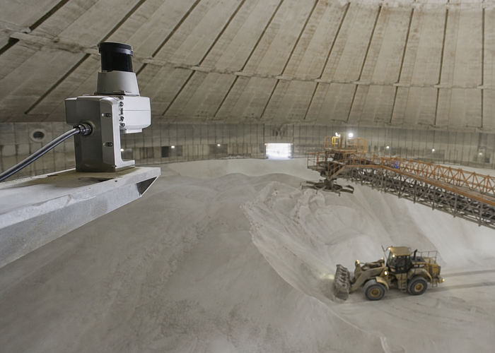 fixed LiDAR monitoring cement raw meal in an enclosed storage hall in a realistic LiDAR application scene