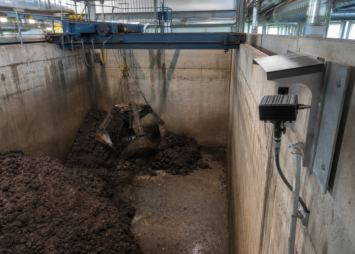 LiDAR volume measurement in a sludge-cake bunker in a realistic LiDAR application scene