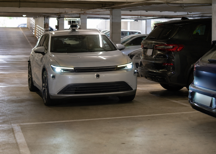 passenger vehicle using LiDAR for parking in a multilevel concrete garage in a realistic LiDAR application scene