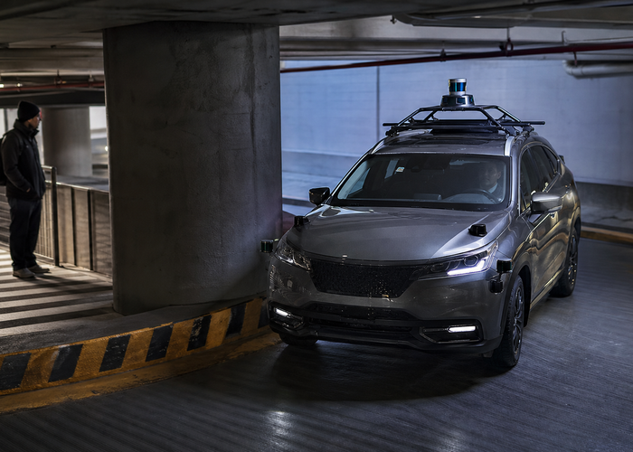 passenger vehicle using LiDAR for parking in a multilevel concrete garage validation scene 2