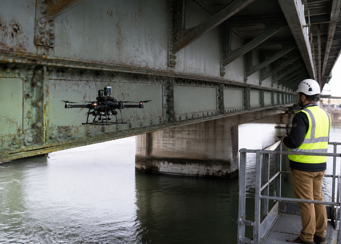 inspection drone using LiDAR beneath a steel bridge validation scene 2