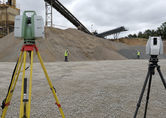 fixed LiDAR scanner monitoring a quarry surge pile beside conveyors and haul trucks validation scene 3