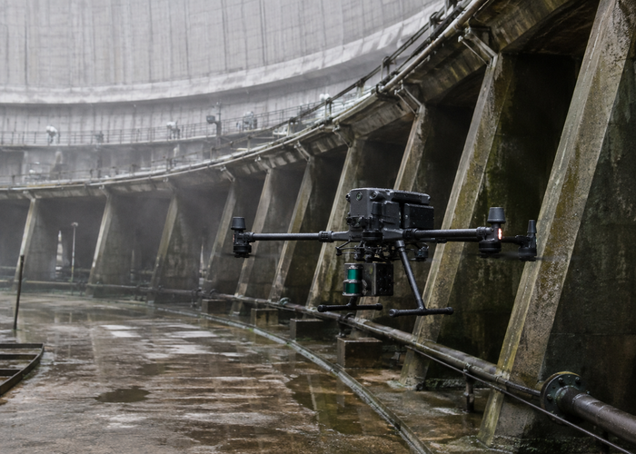 inspection drone using physical LiDAR beside a large industrial cooling tower validation scene 2