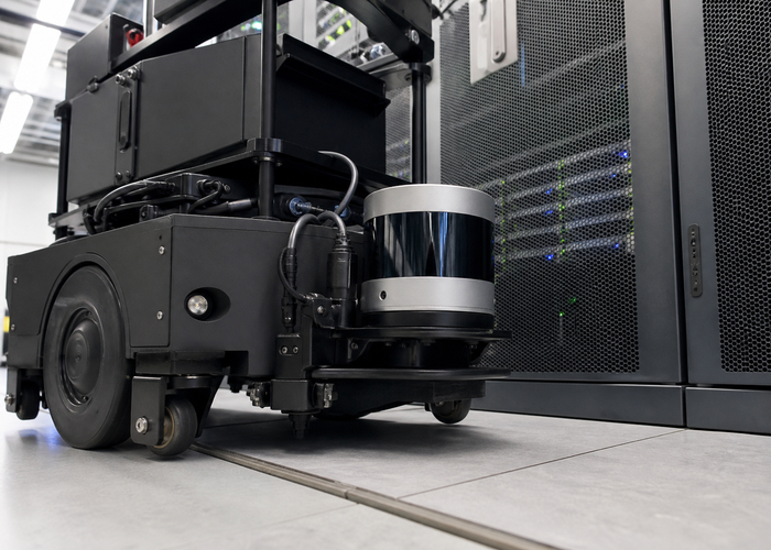 autonomous inspection robot with physical LiDAR navigating a realistic data center aisle validation scene 2